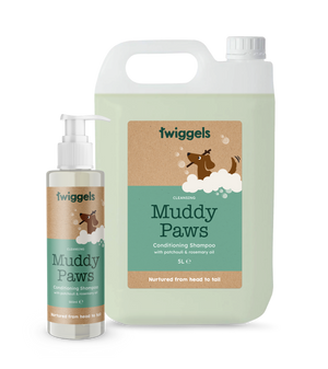 Two bottles of Twiggels Muddy Paws dog shampoo on a white background