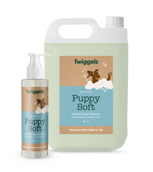 Two bottles of Twiggels Puppy Soft shampoo on a white background